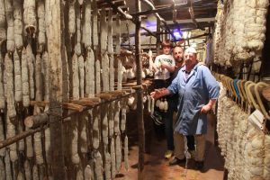 Visit the cellars of the Mastro Peppe pork butchery in Norcia