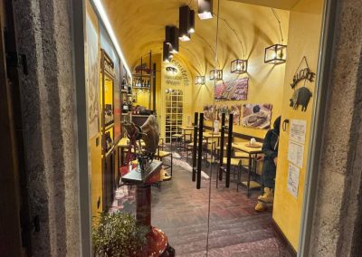 The interior room of the Mastro Peppe Degusteria in the historic center of Norcia.